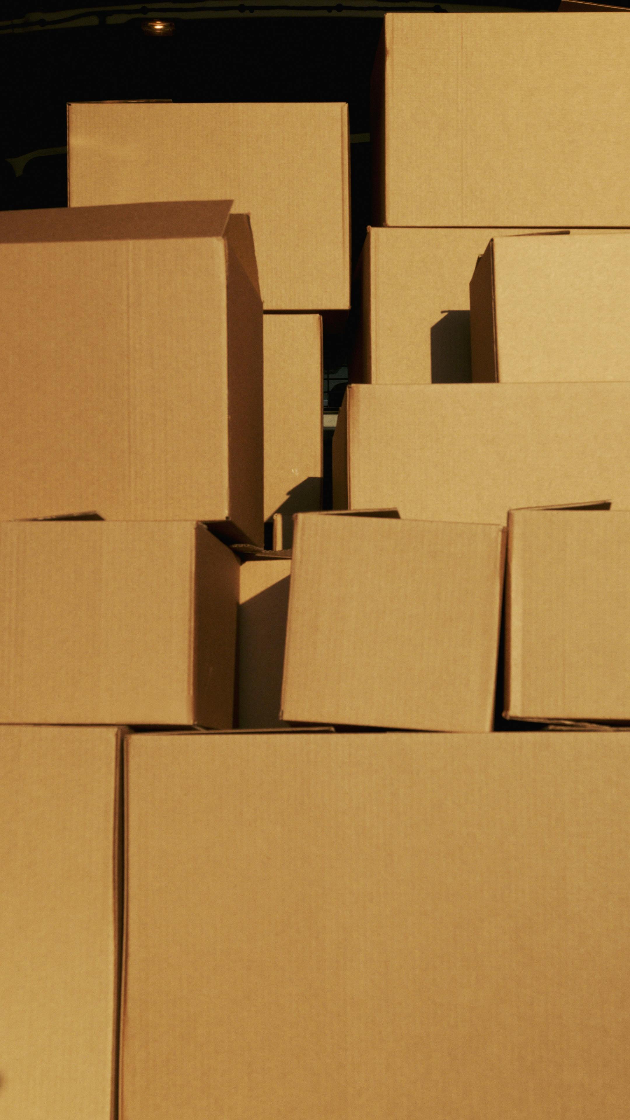 Stacked corrugated cardboard boxes